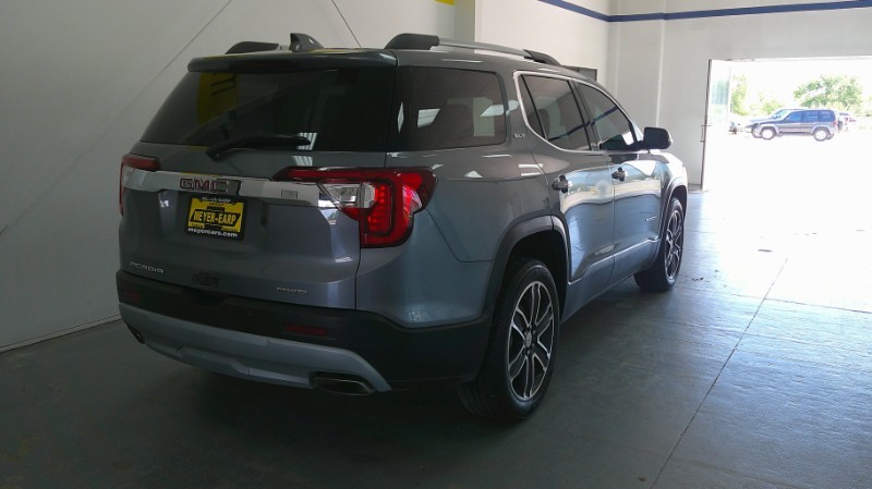 Used 2021 GMC Acadia SLT with VIN 1GKKNULS0MZ114066 for sale in Kansas City