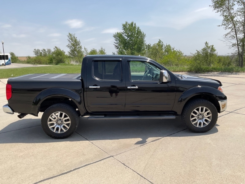 2013 Nissan Frontier 4.0 SL Crew Cab 4X4 AT SWB's photo